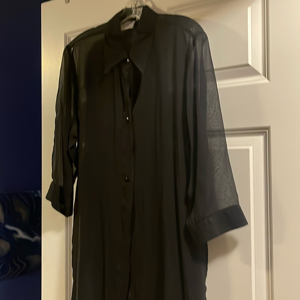 Woman’s Black Tunic style Blouse.